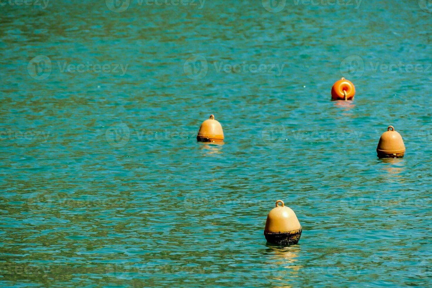 Floating border marks in the sea. photo