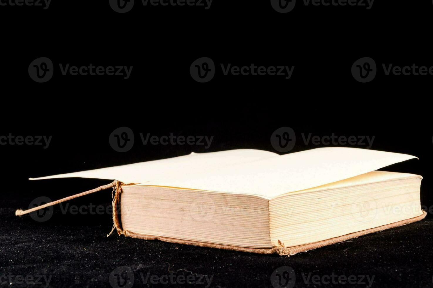 Isolated book on black background photo