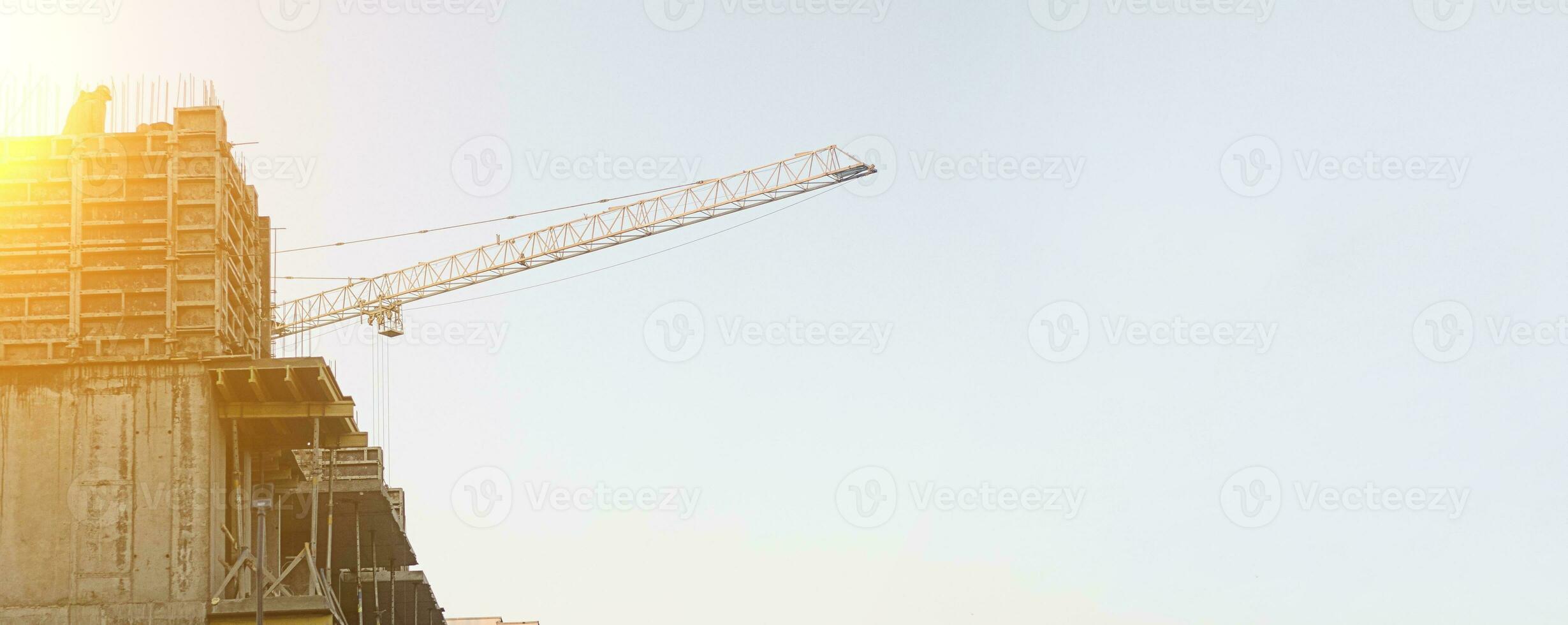 Construction site and construction crane on sunset. photo