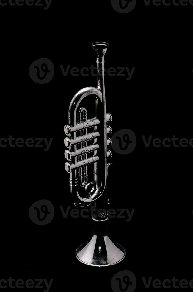 A trumpet on black background photo