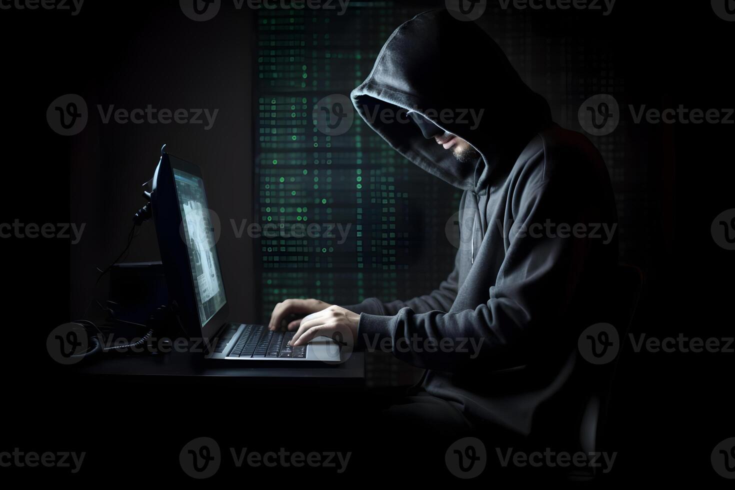 Internet hacker sitting at personal computer laptop tablet photo