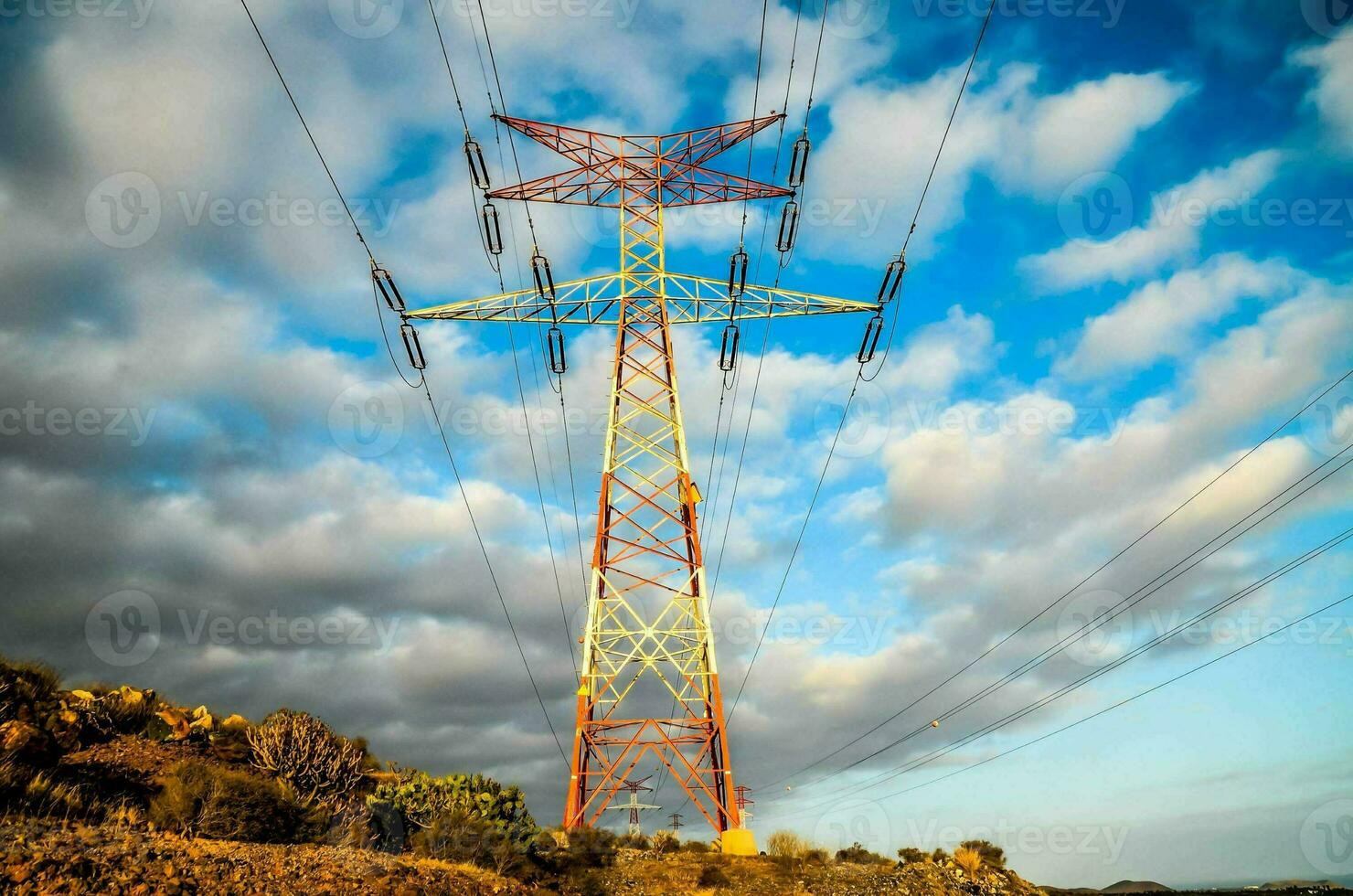 A field with electricity poles photo