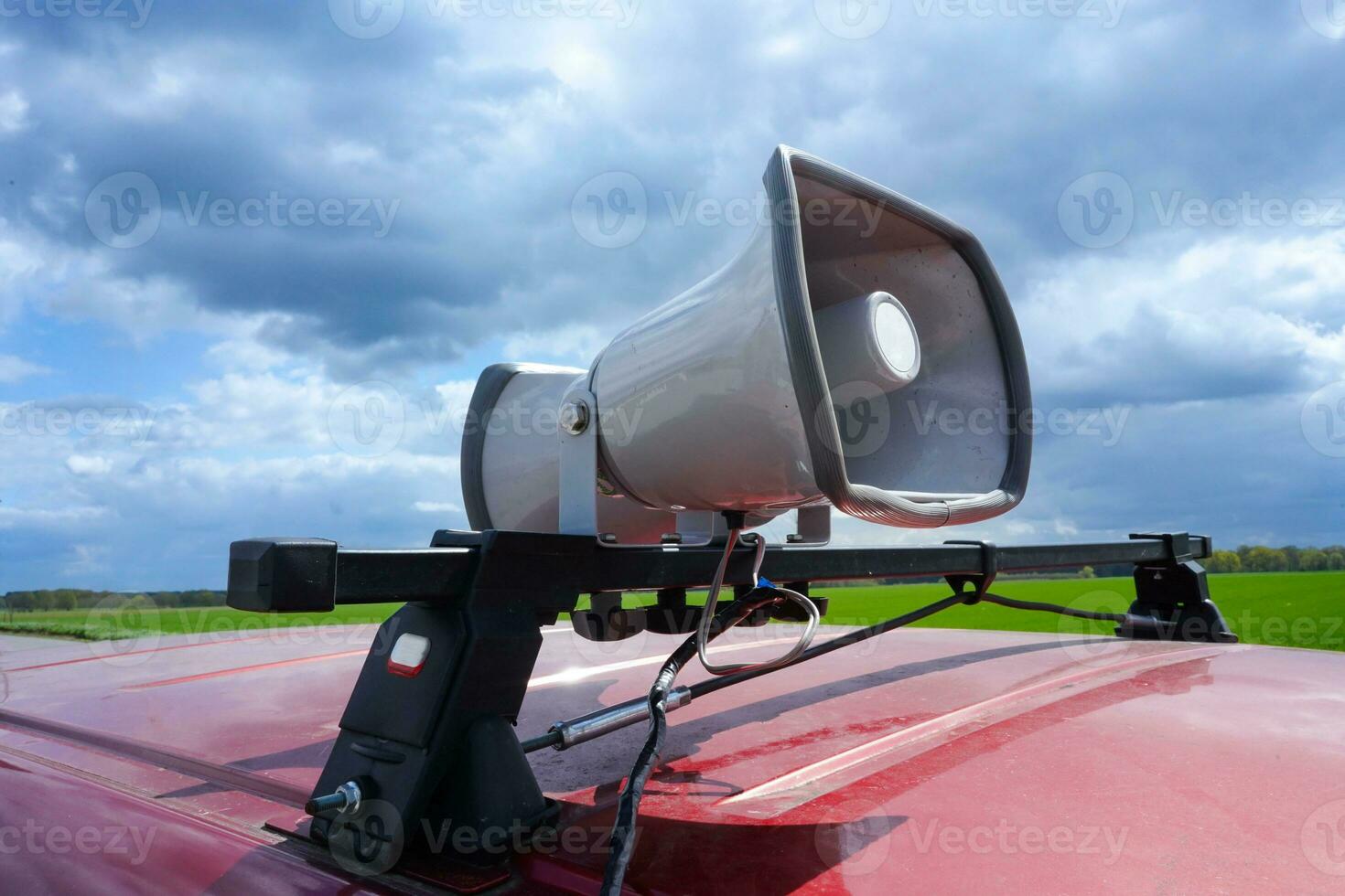 Car with megaphones on the roof. Advertising car with big speakers on roof. Car sound system for audio advert. photo