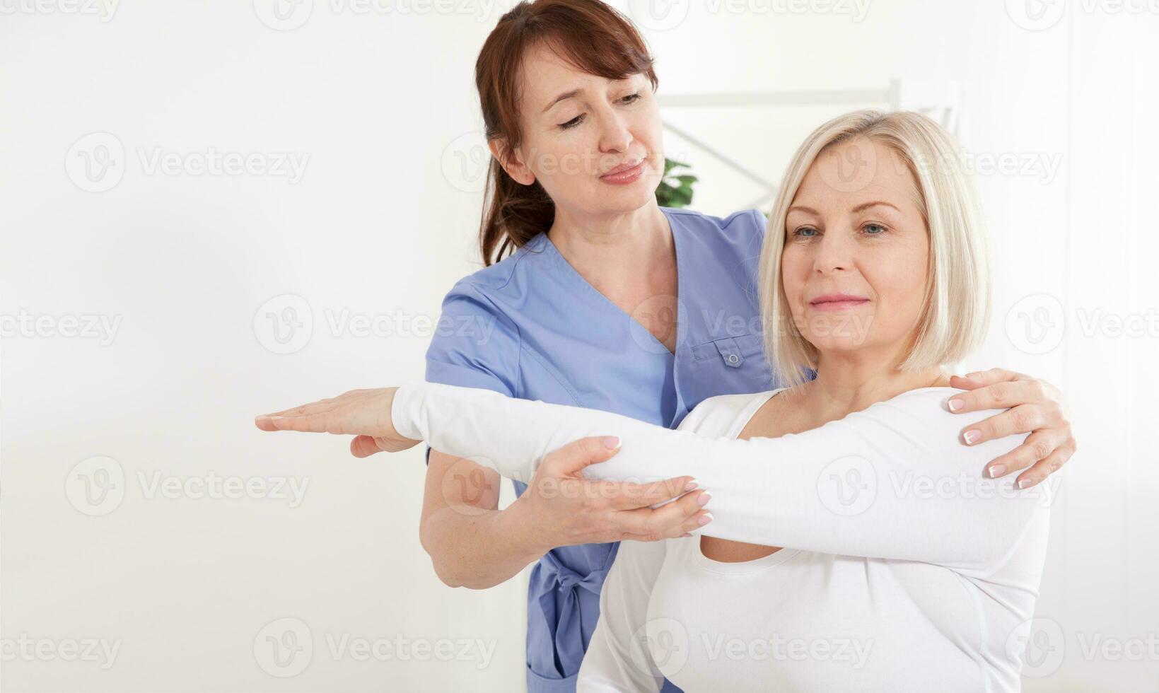 Doctor and patient in rehabilitation clinic. Closeup photo