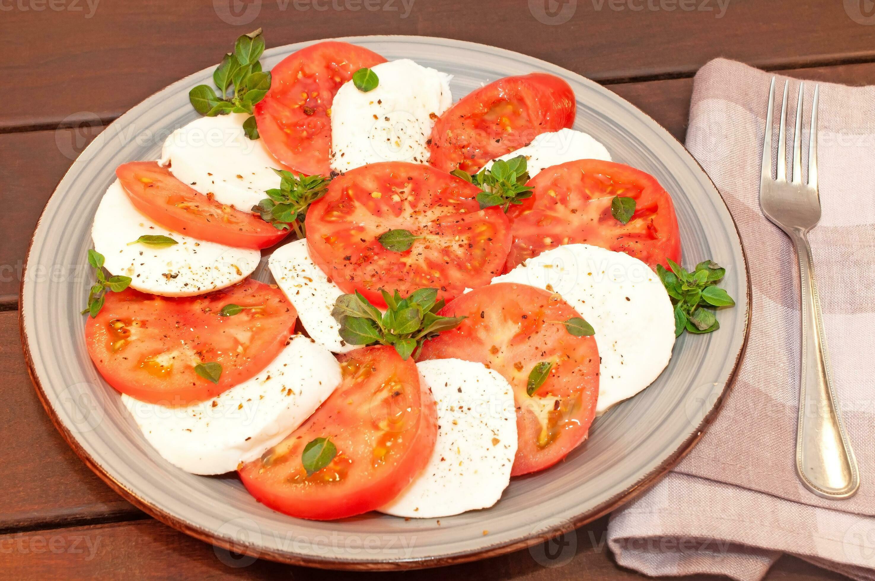 Tomato and mozzarella Caprese salad with sauce 23284413 Stock Photo at ...