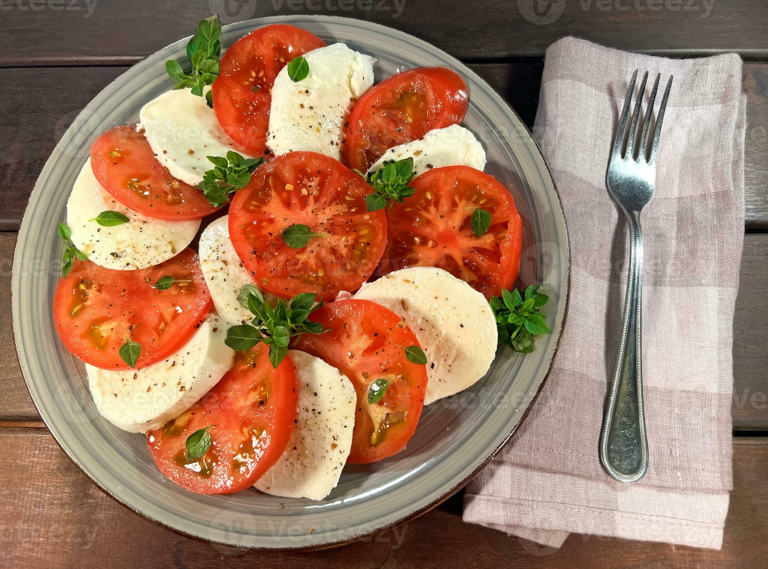 Tomato and mozzarella Caprese salad with sauce 23284422 Stock Photo at ...