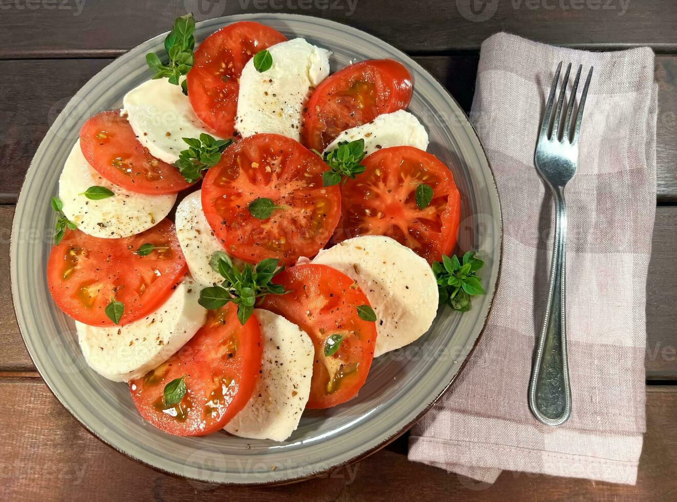 Tomato and mozzarella Caprese salad with sauce 23284422 Stock Photo at ...