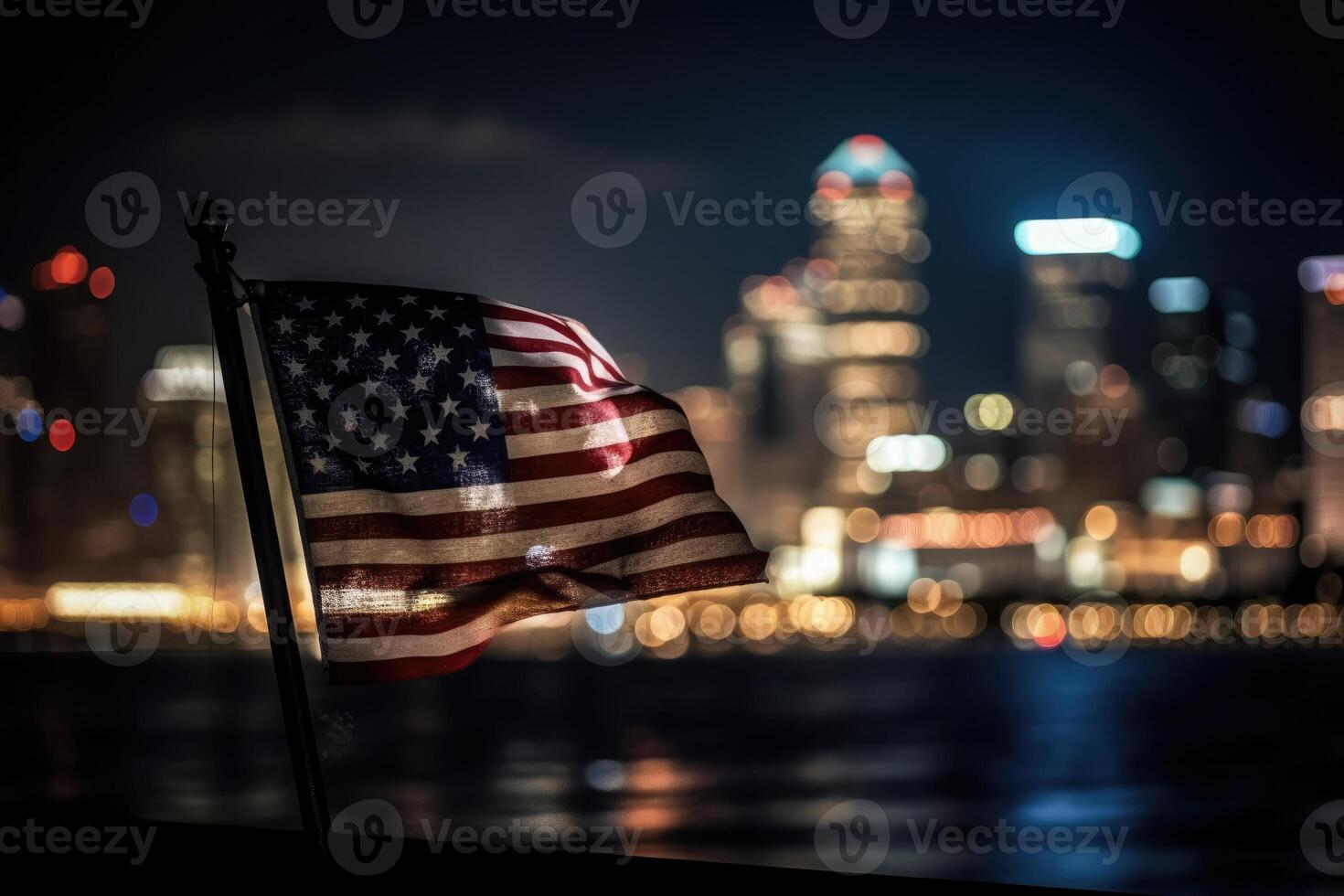 Photo of american flag in front of bokeh effect of cityscape in background.