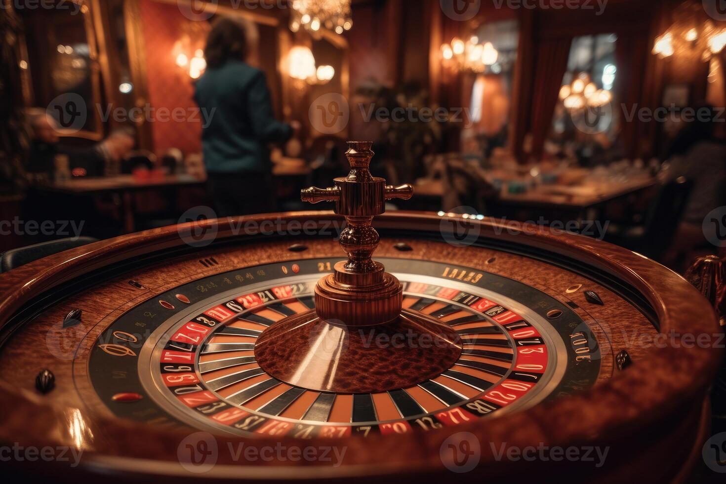 Roulette wheel, in the middle of the table on the casino table. photo