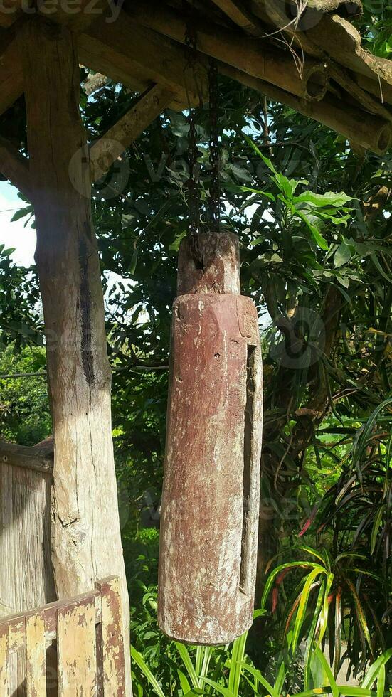 traditional kentongan in village shack photo