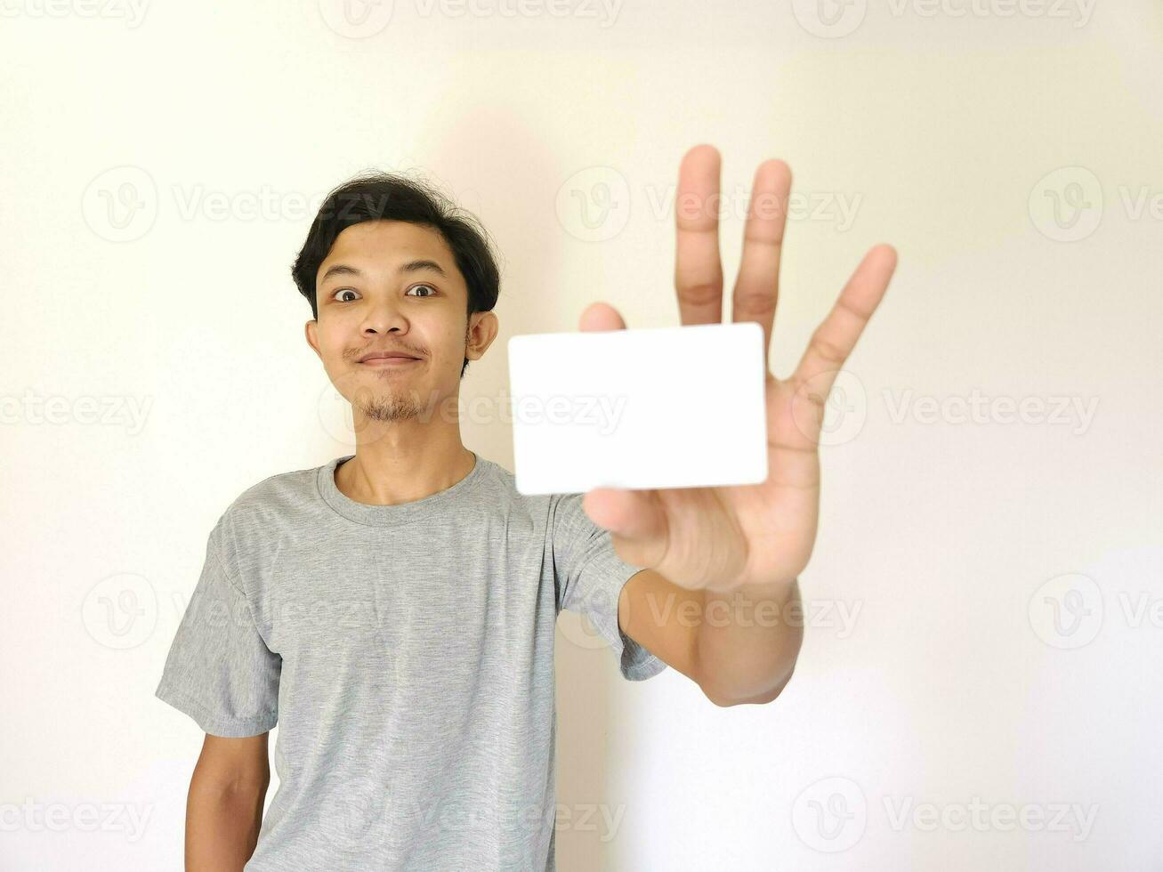 man showing close up empty card to focus on the card. photo