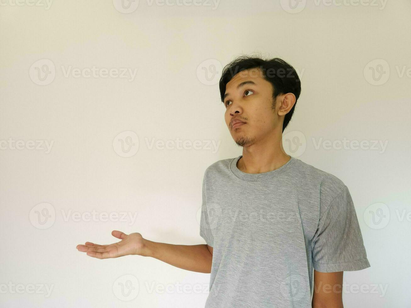 Worries face expression of Asian man who got problem isolated on white photo