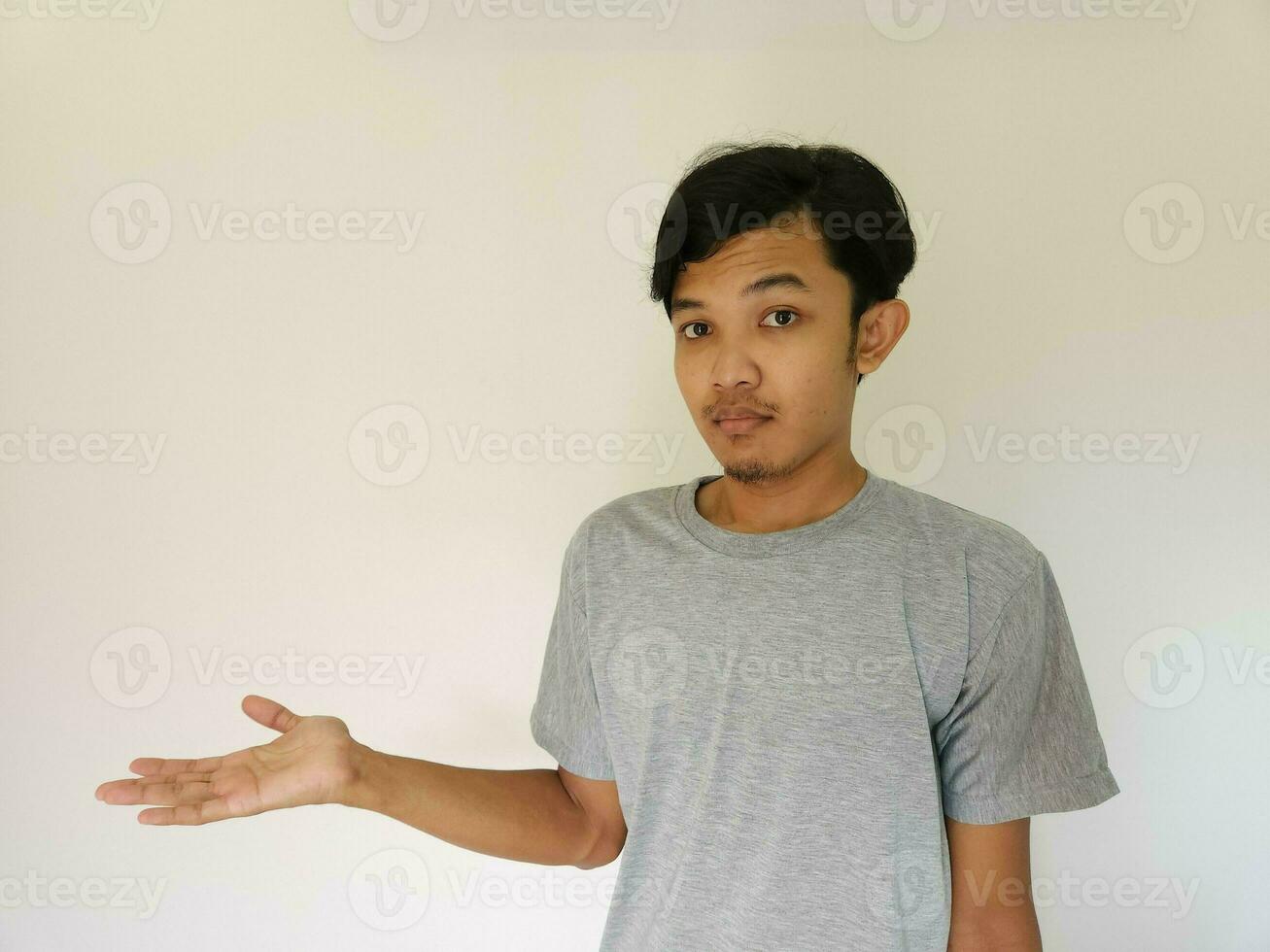 Worries face expression of Asian man who got problem isolated on white photo
