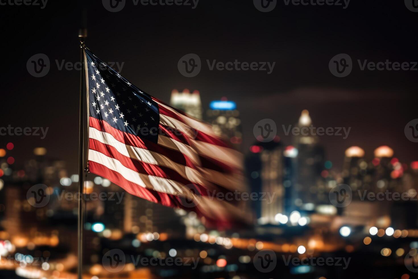 Photo of american flag in front of bokeh effect of cityscape in background.