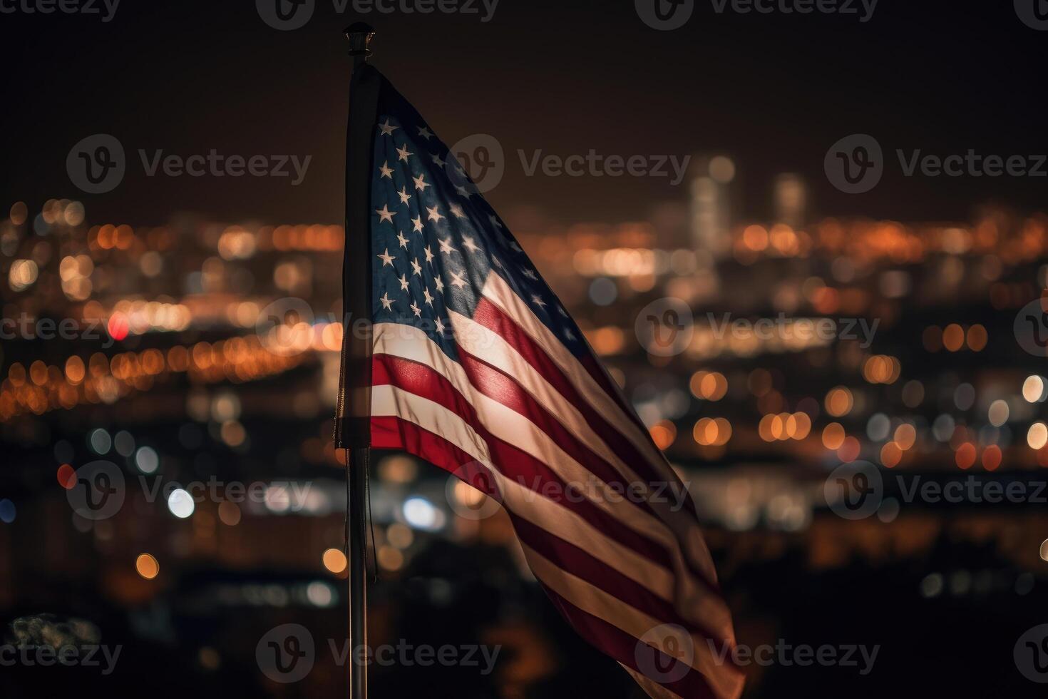 Photo of american flag in front of bokeh effect of cityscape in background.