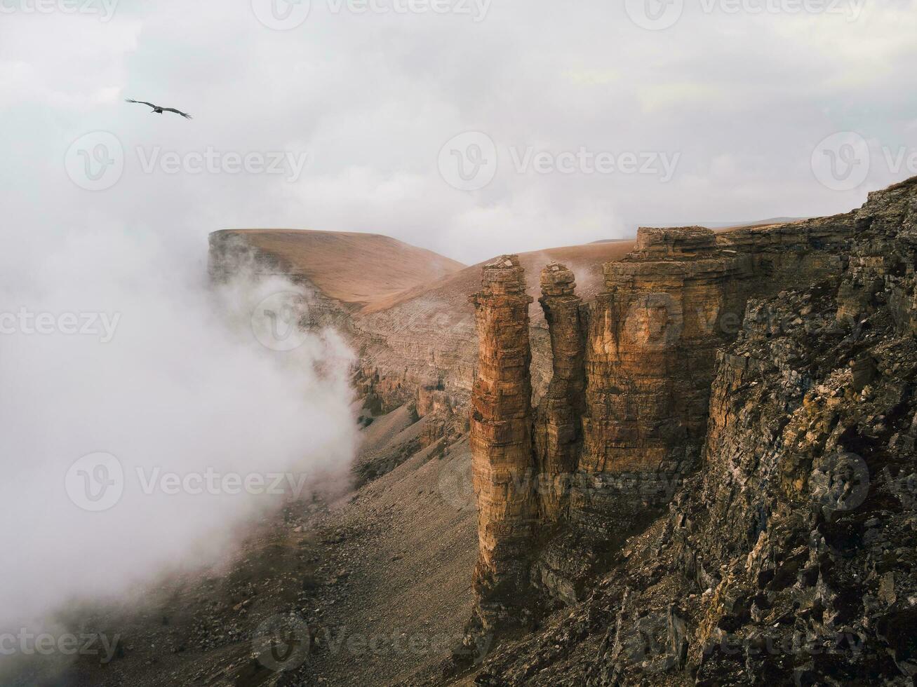 Soft focus. Bermamyt plateau. Foggy mountain view from cliff at photo