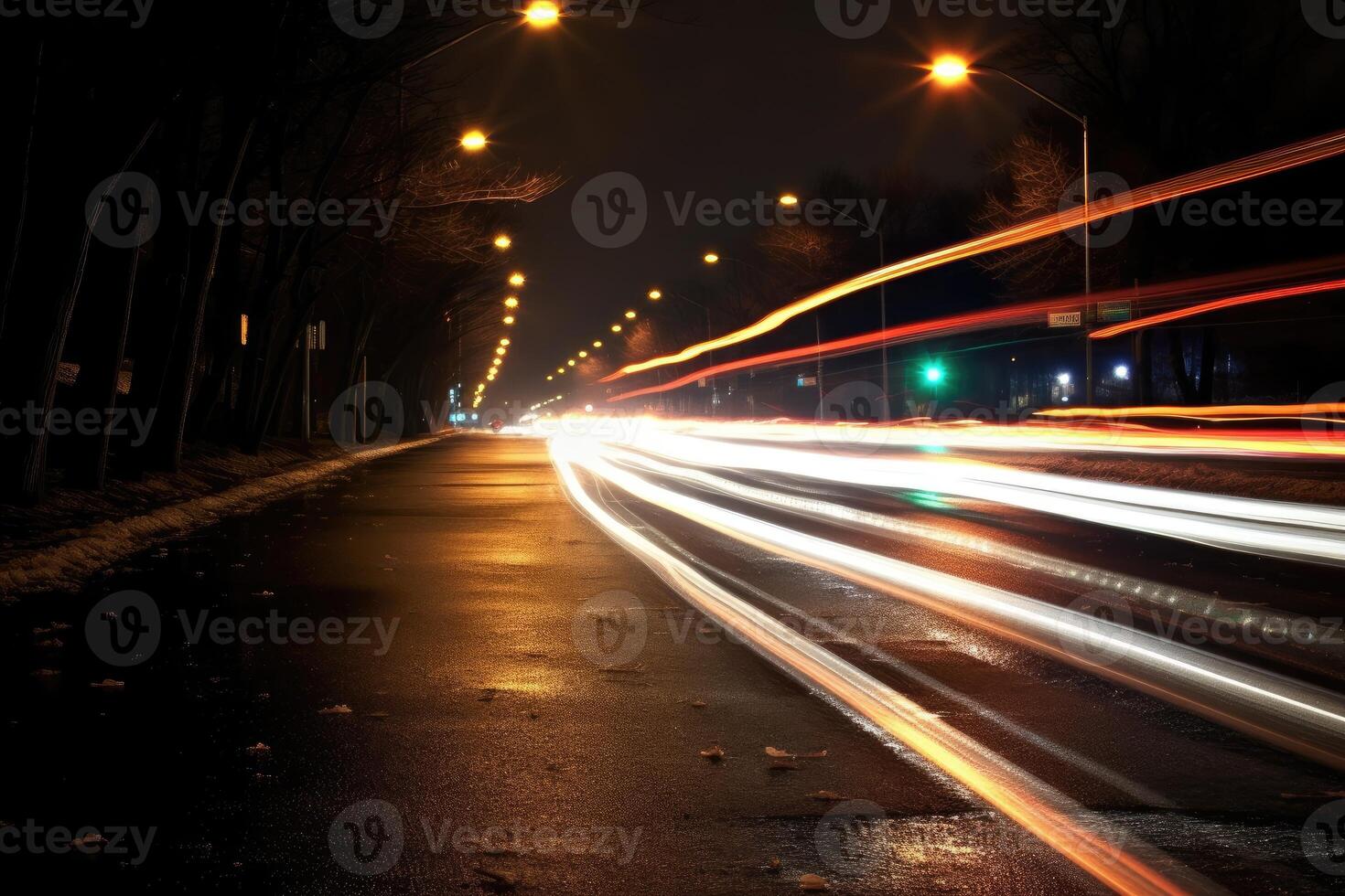 Photo of night city lights and traffic speeding by cars. Bokeh effect background.