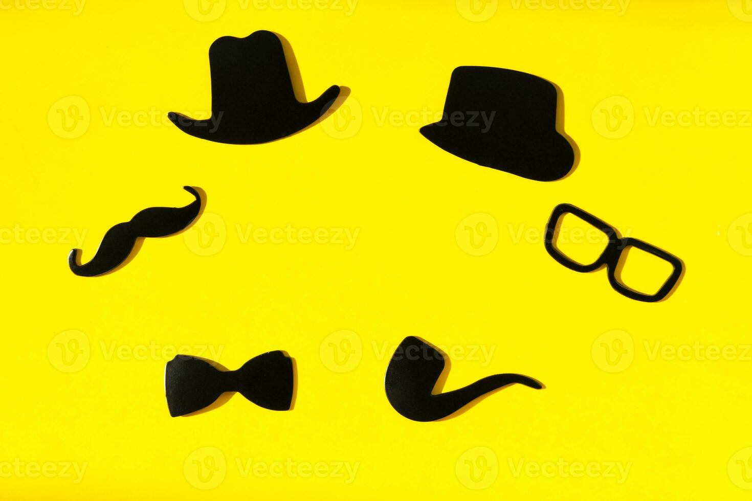 Happy Fathers Day sticker, black hat, bow tie, glasses and mustache, on yellow. Hipster objects. Father's Day is a holiday. Design Blank space for an inscription. Flat composition with greeting card. photo