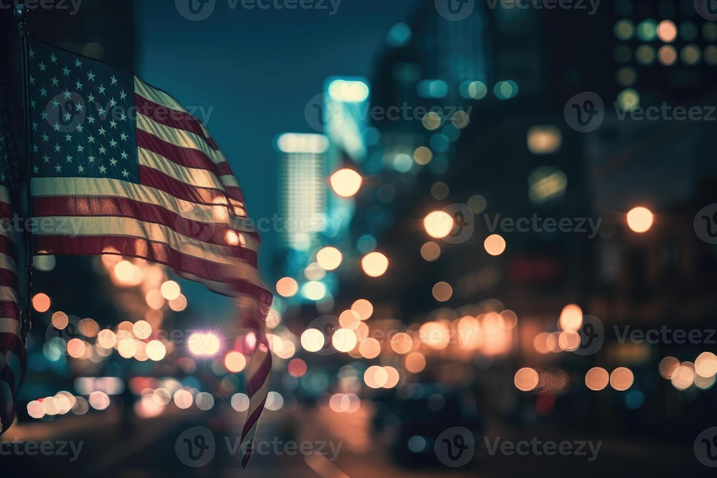 Photo of american flag in front of bokeh effect of cityscape in background.