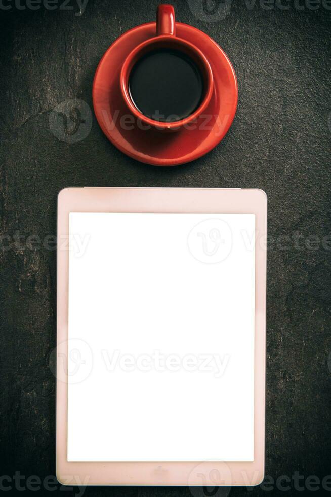 Blank tablet and coffee photo