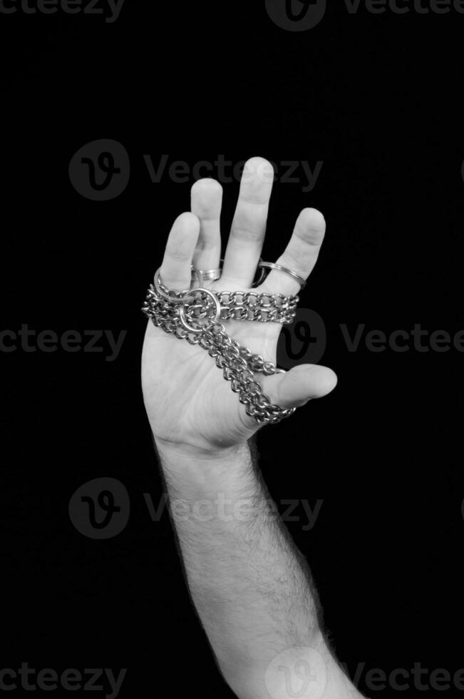 Locked hand with chains photo