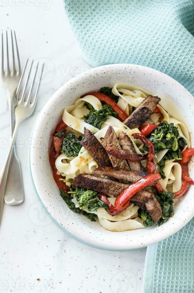 Beef and vegetables pasta 23297692 Stock Photo at Vecteezy