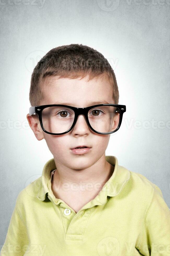 Boy with glasses portrait photo