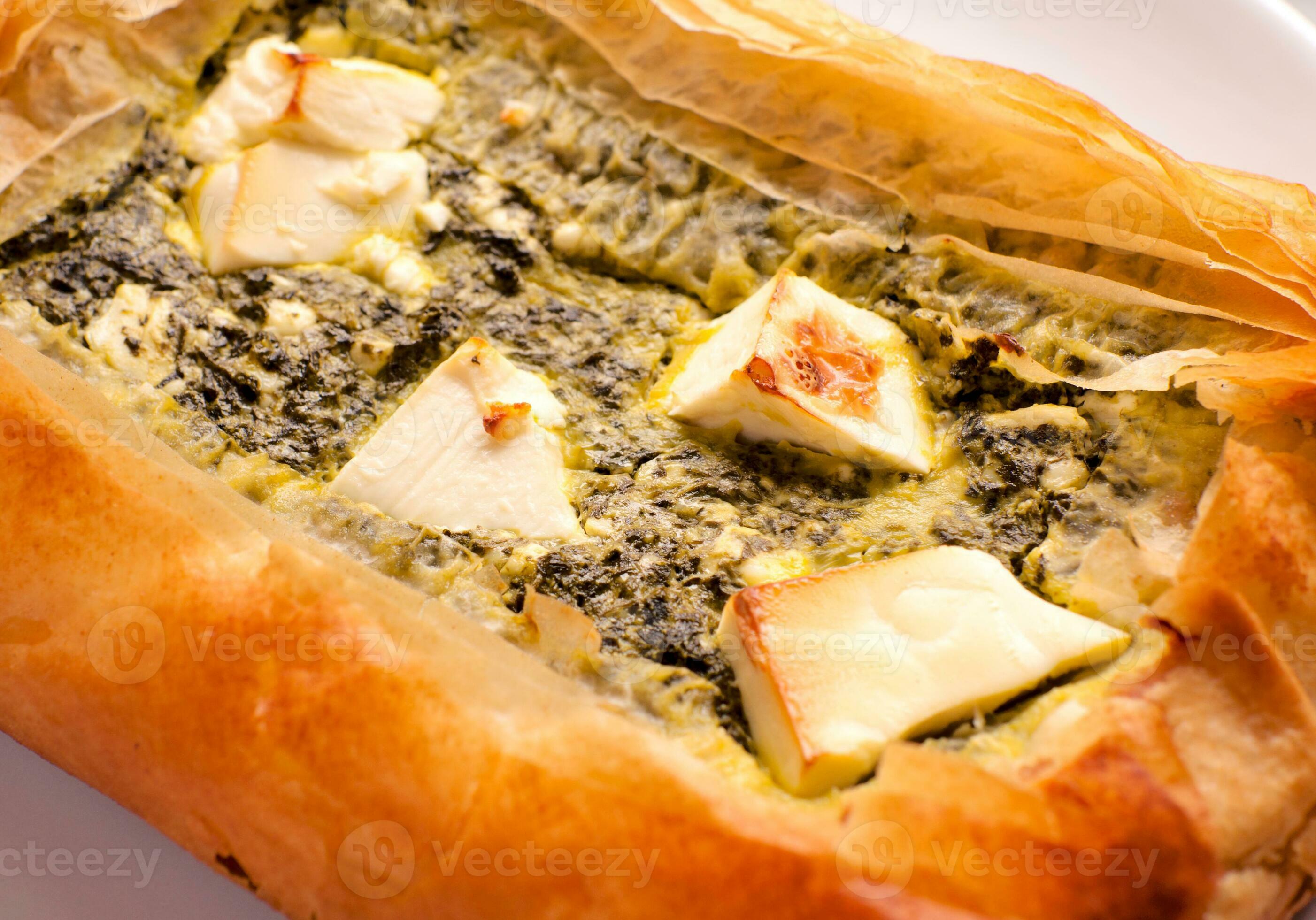 Feta cheese and spinach pie 23300110 Stock Photo at Vecteezy