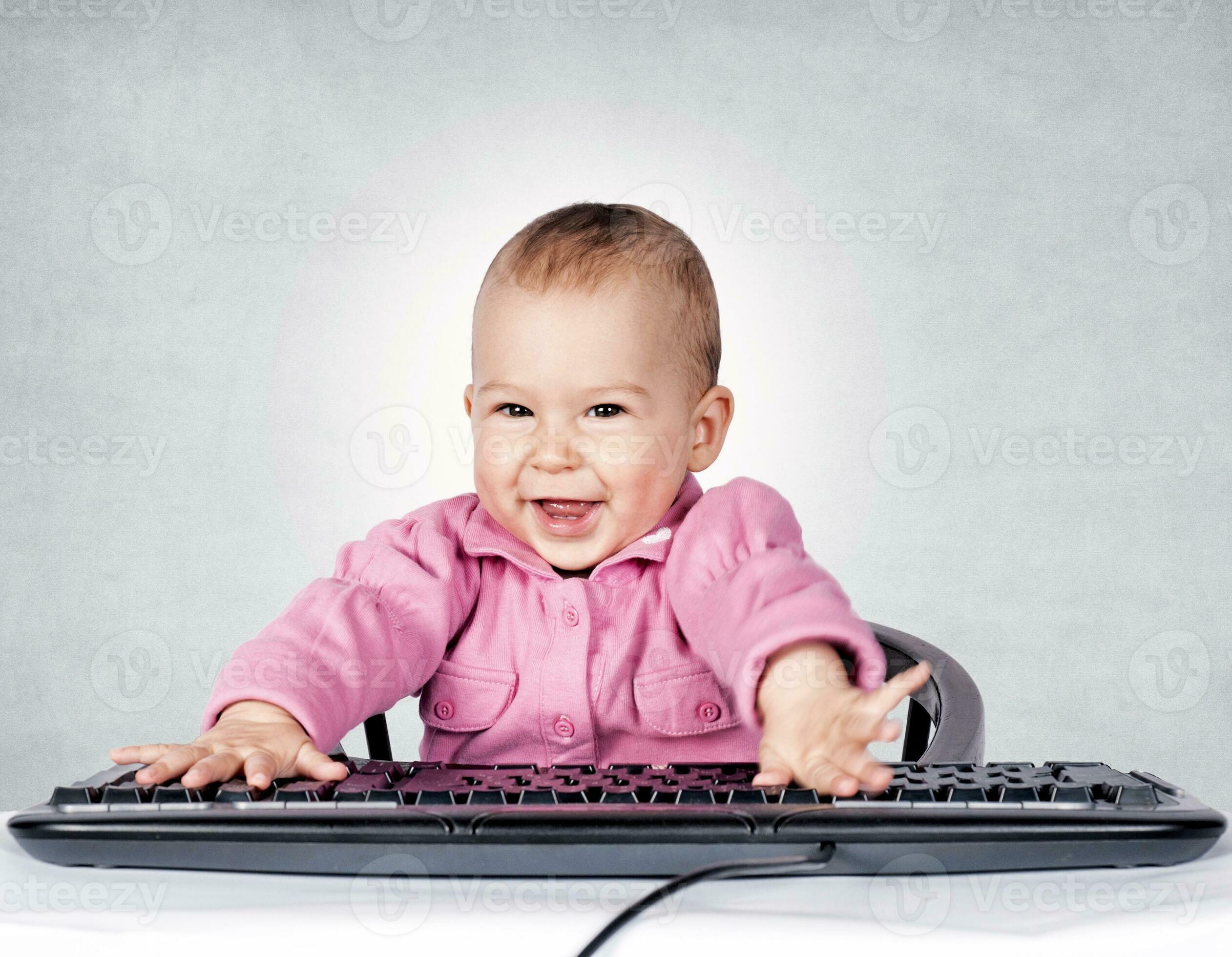 Baby typing concept 23300675 Stock Photo at Vecteezy