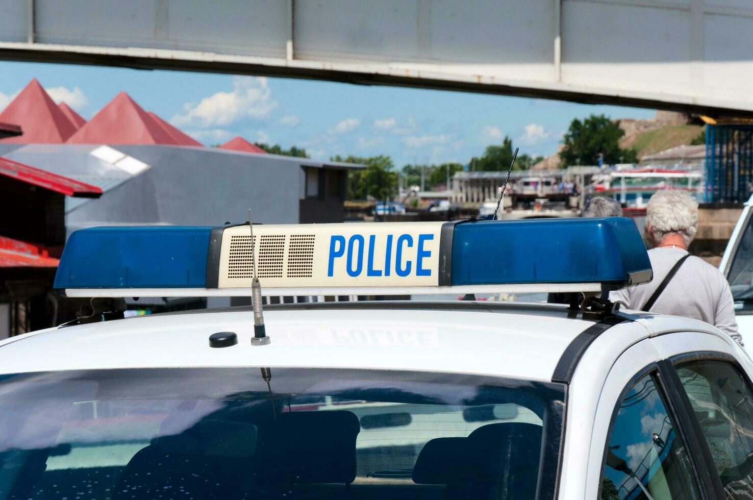 Police car with sign photo