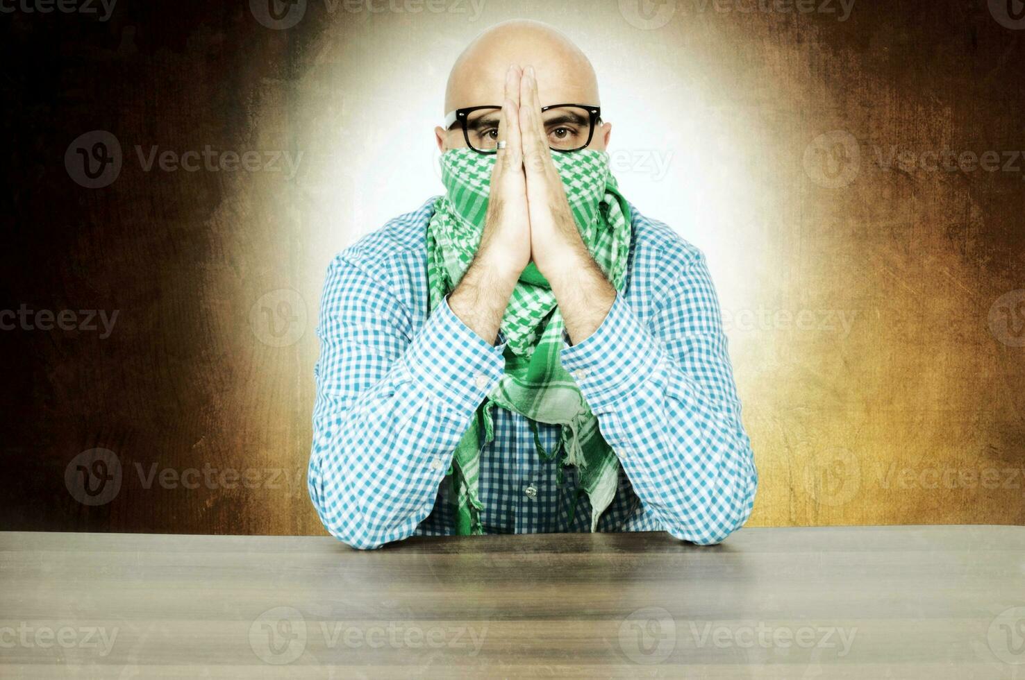 Terrorists pray concept photo