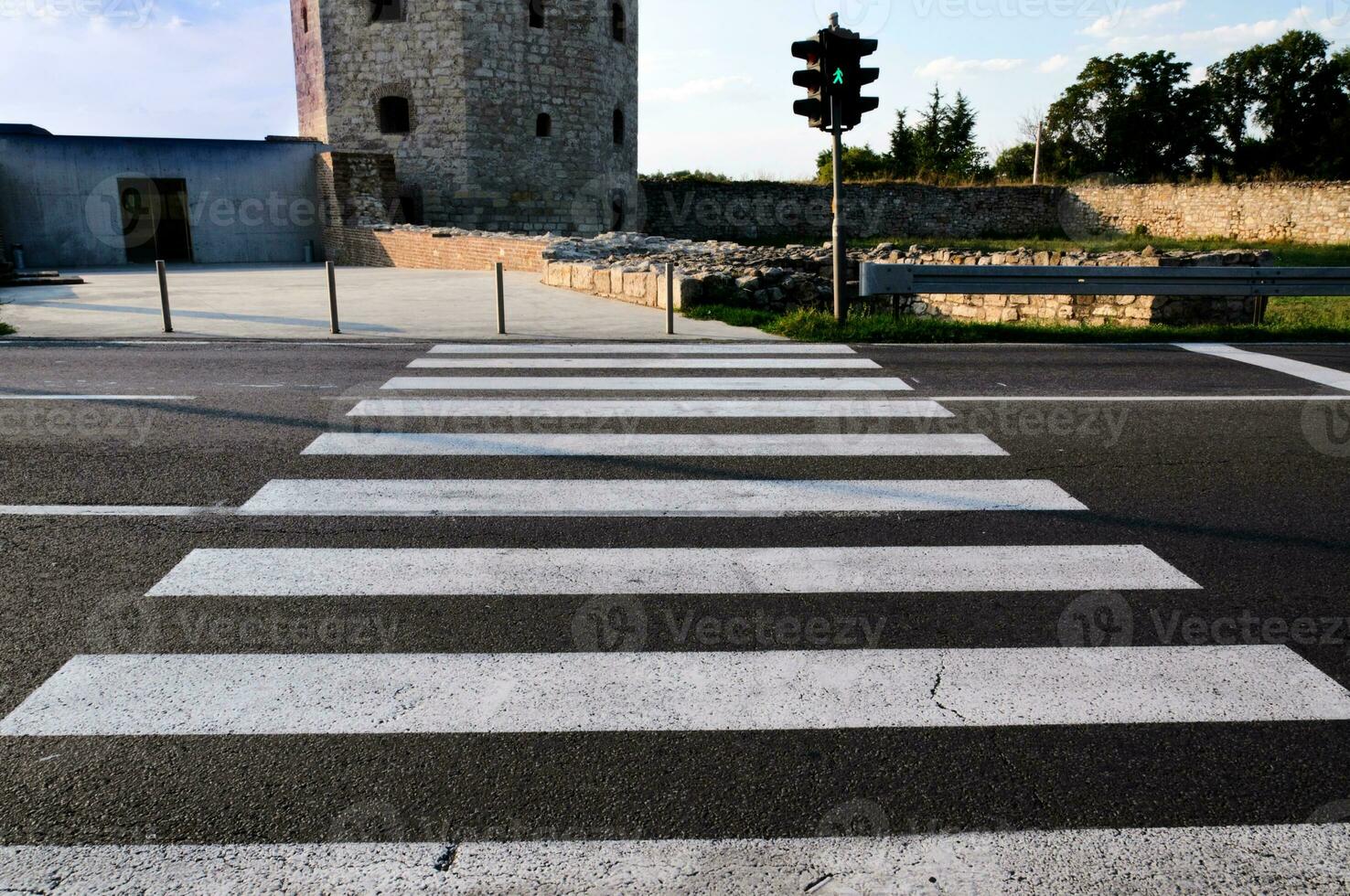 Pedestrian crossing on street photo