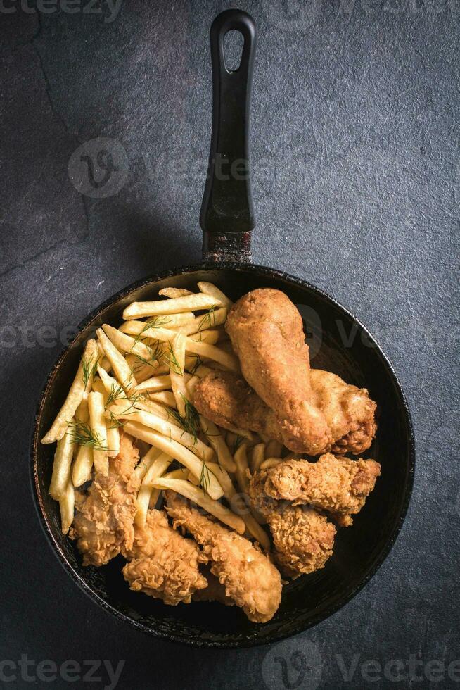 Fried chicken with french fries photo