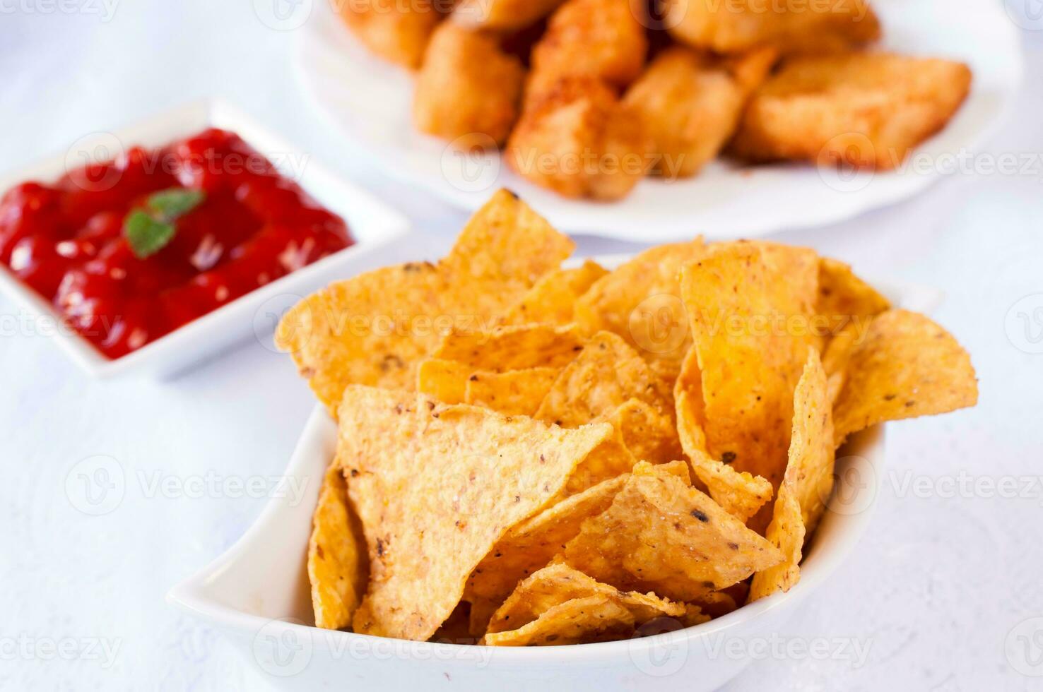 Tortilla chips with sauce photo