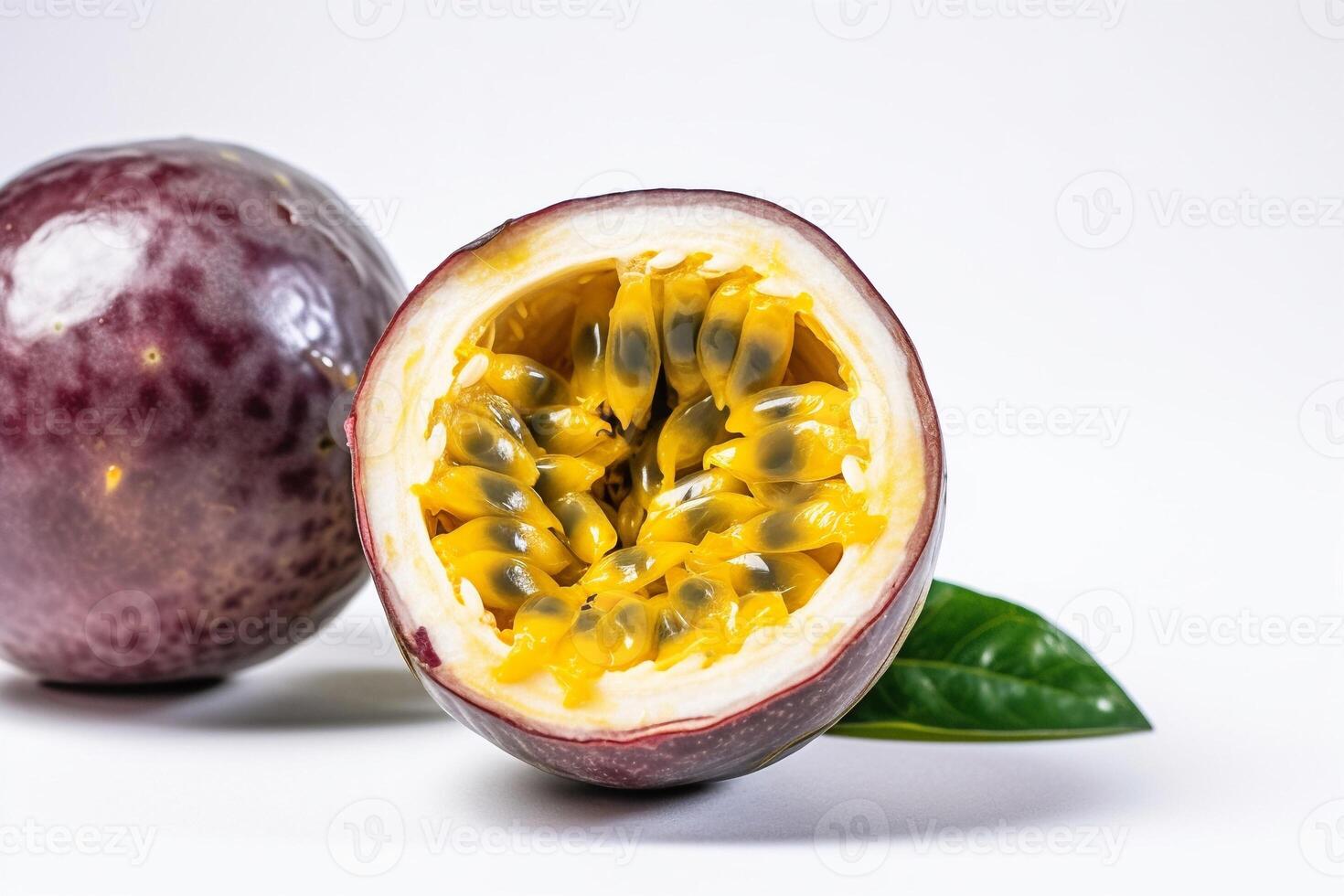 Passion fruit with leaf isolated on white photo