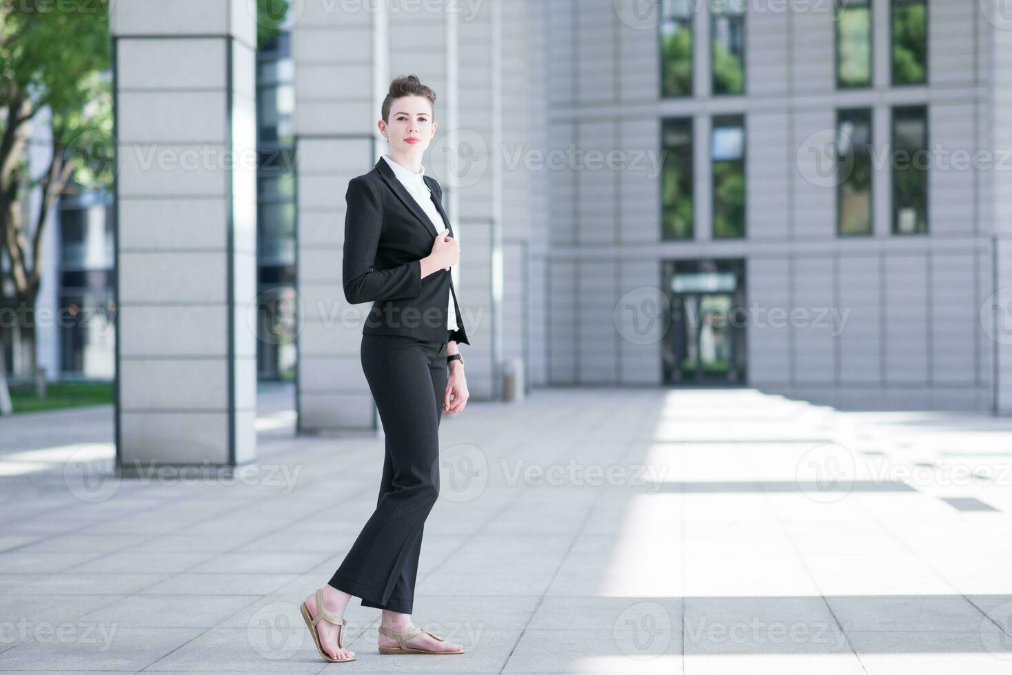 Modern business woman showing confident photo