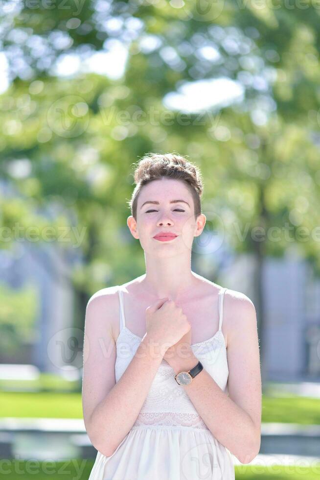 A portrait of a beautiful young Caucasian woman outdoor photo