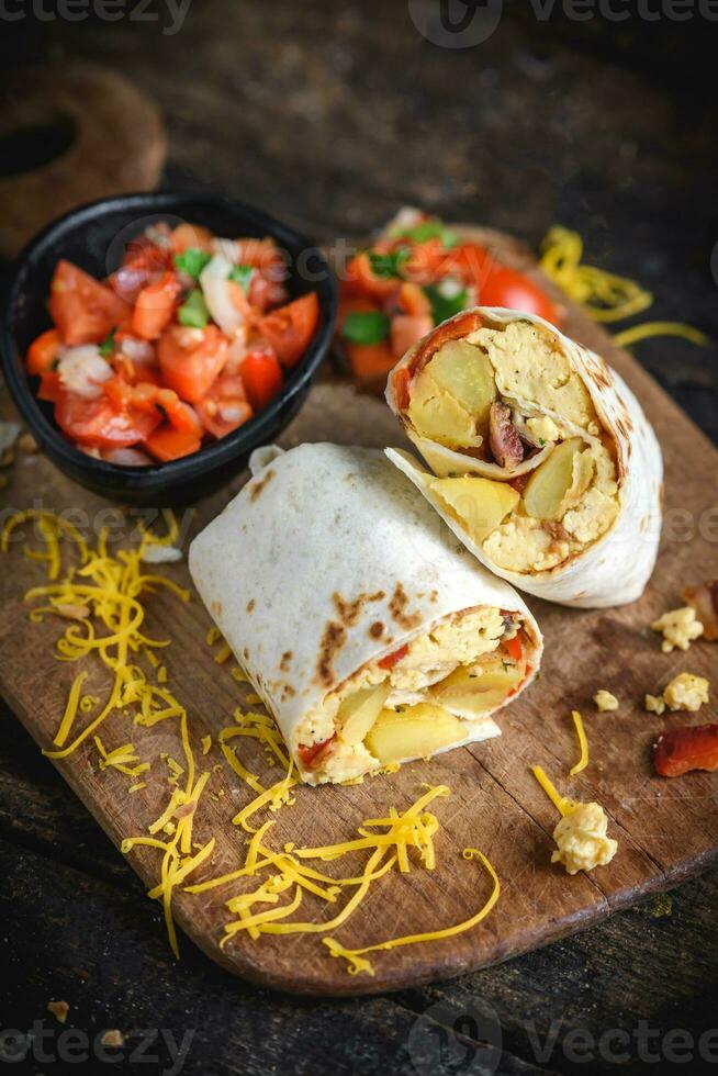 breakfast burritos tortilla 23307608 Stock Photo at Vecteezy
