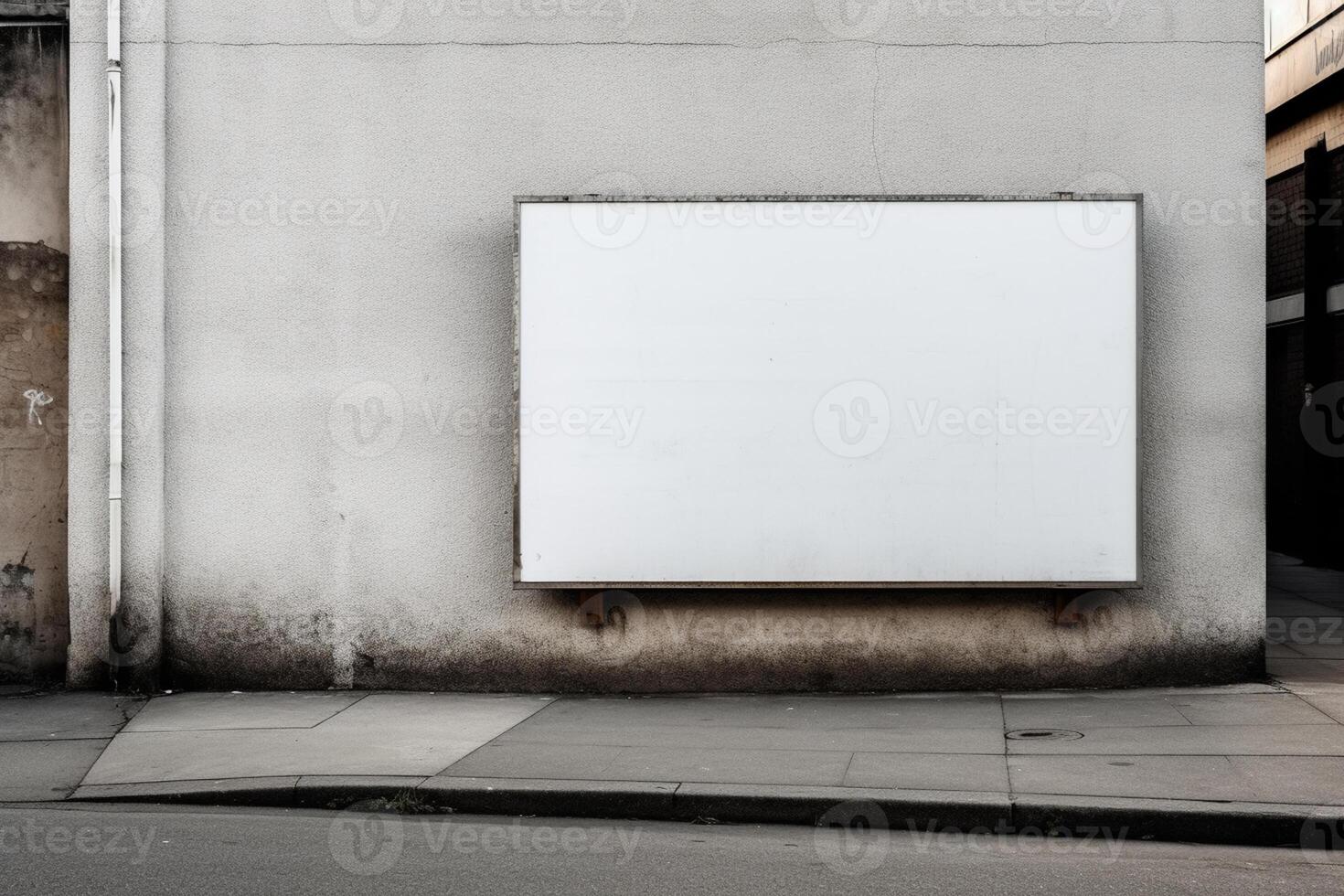A blank white billboard mockup on a sidewalk in a city photo