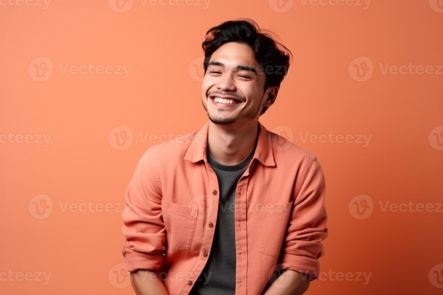 a man on solid color background with a Smile facial expression photo