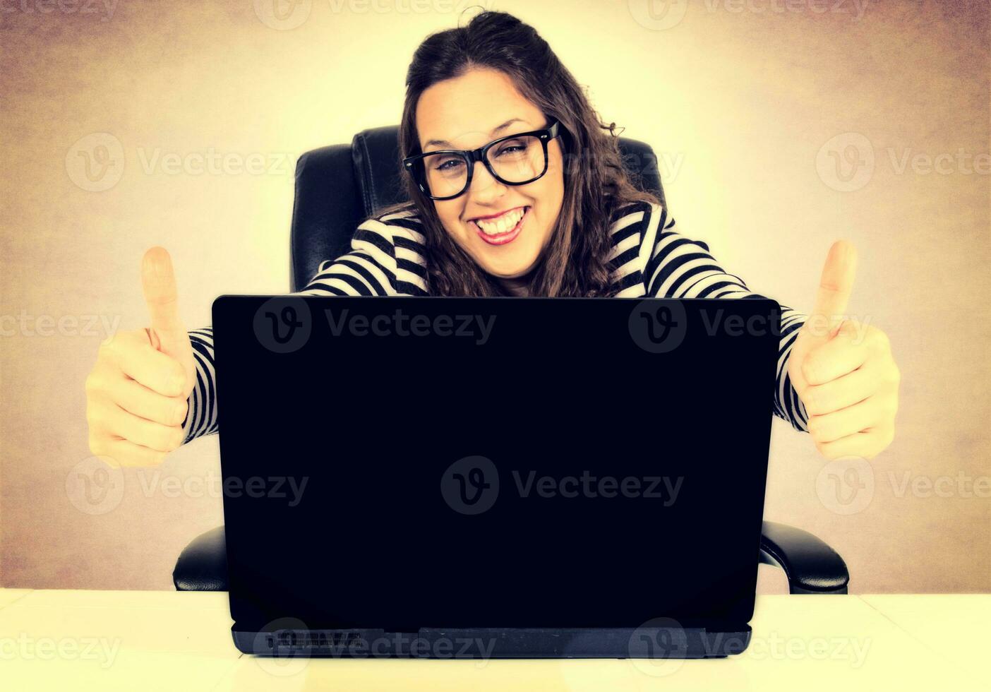 Positive female on the laptop photo
