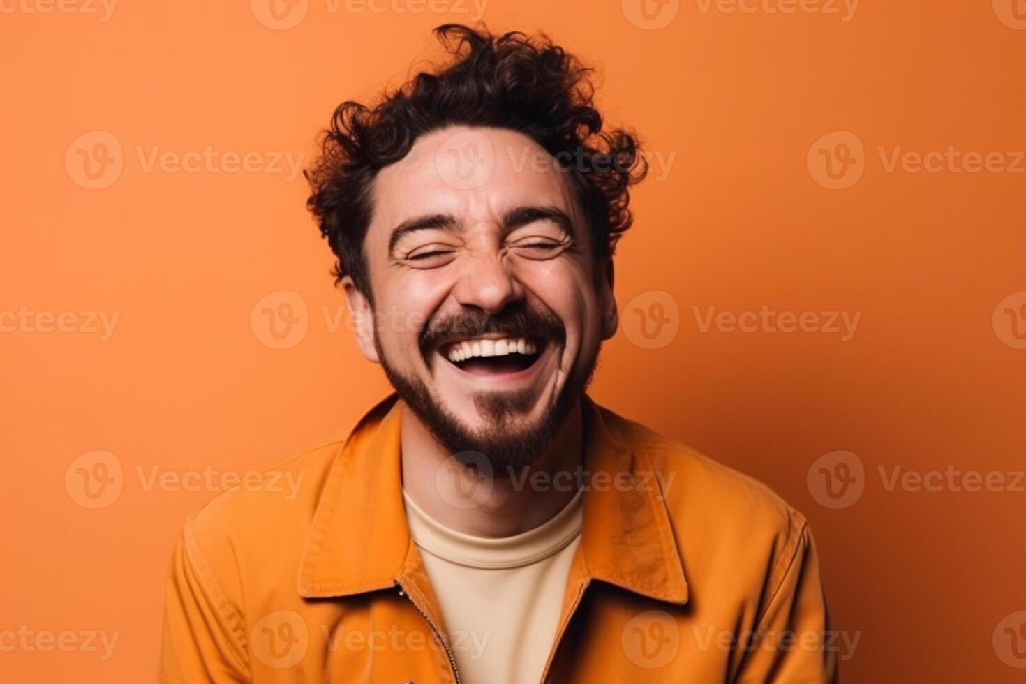 a man on solid color background photoshoot with Laugh face experession photo