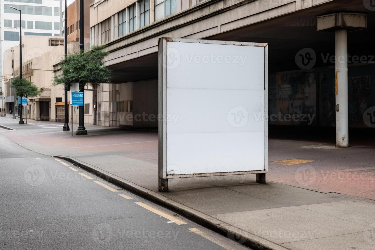 A blank white billboard mockup on a sidewalk in a city photo
