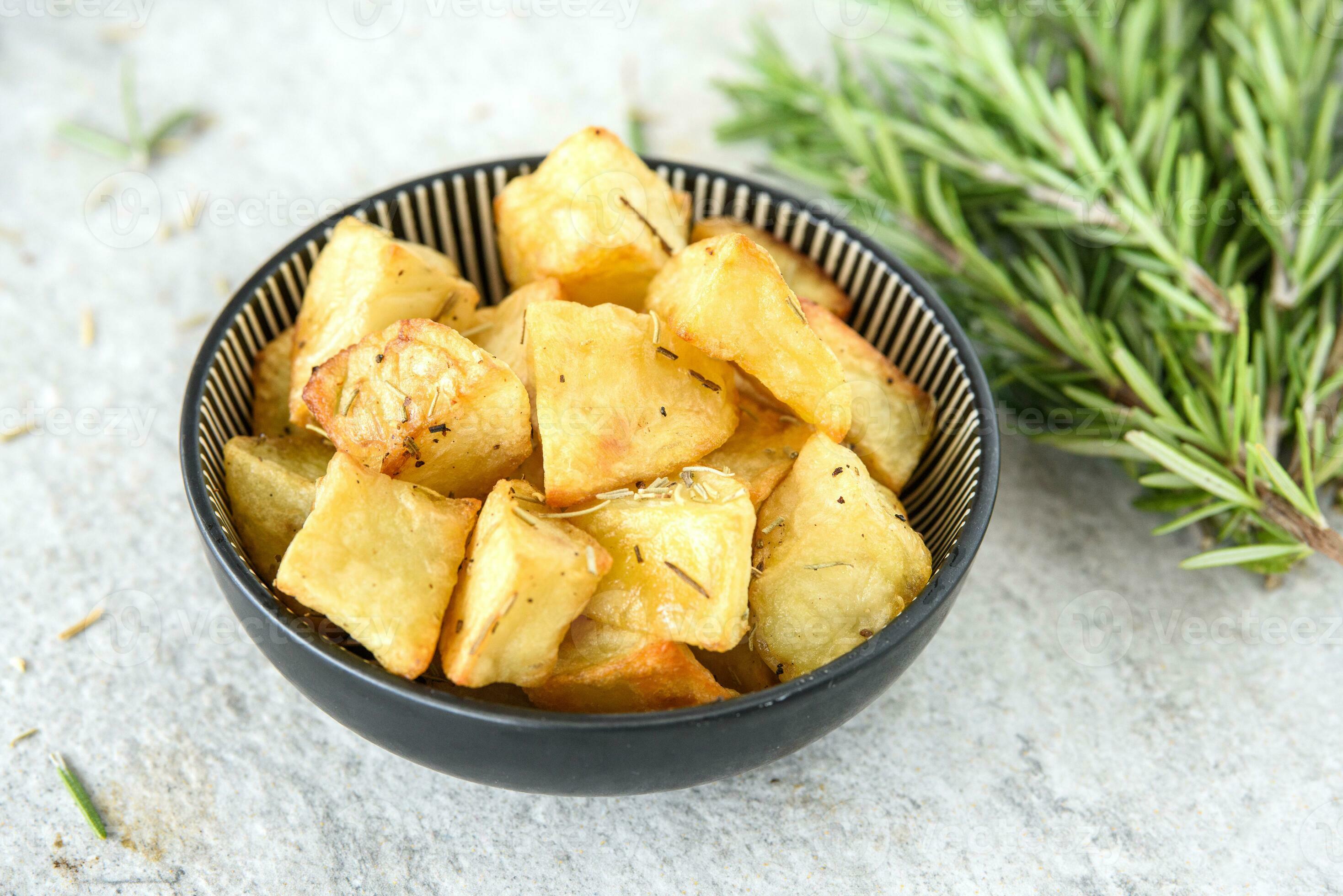 Crispy baked potatoes 23309493 Stock Photo at Vecteezy