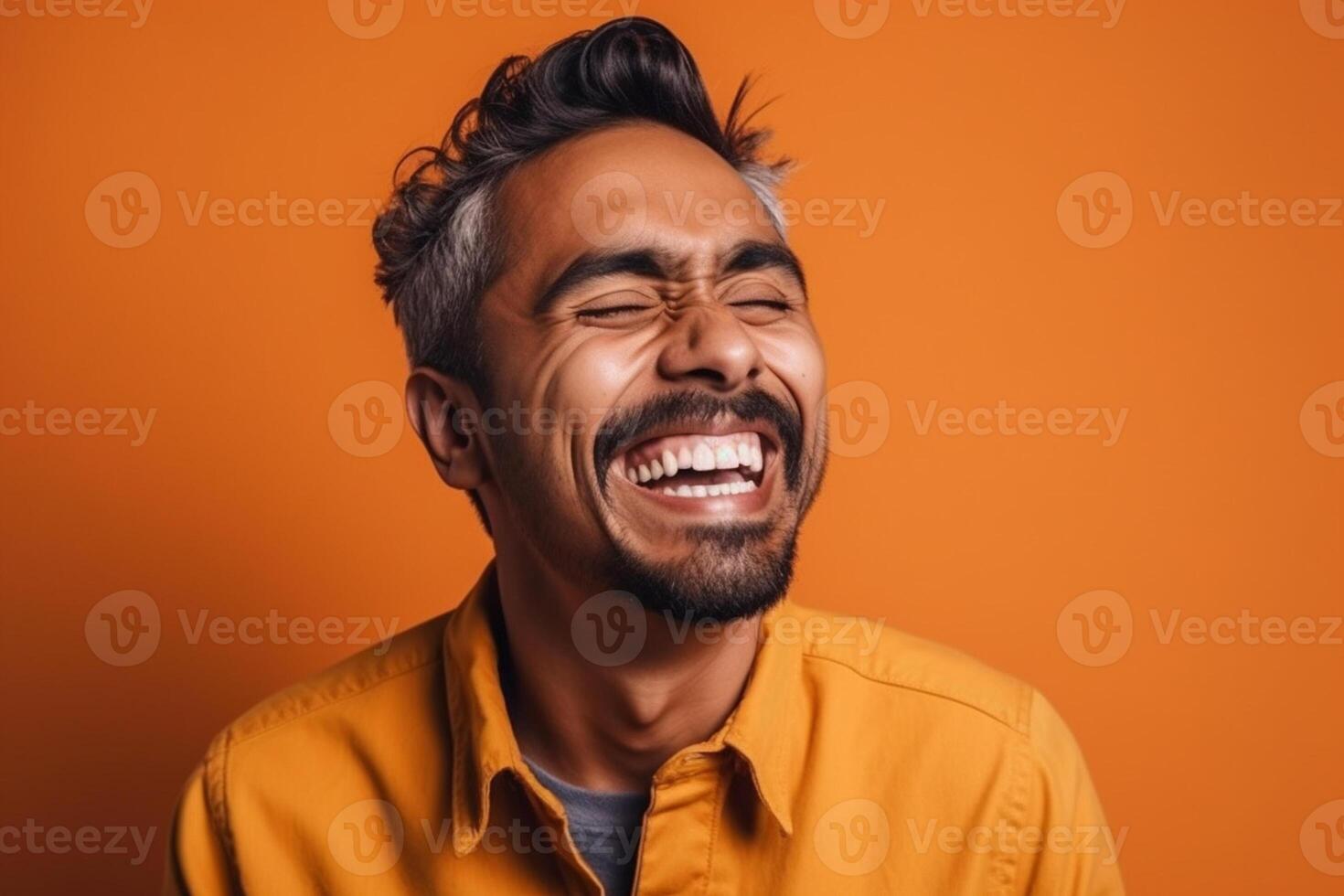 a man on solid color background photoshoot with Laugh face experession photo