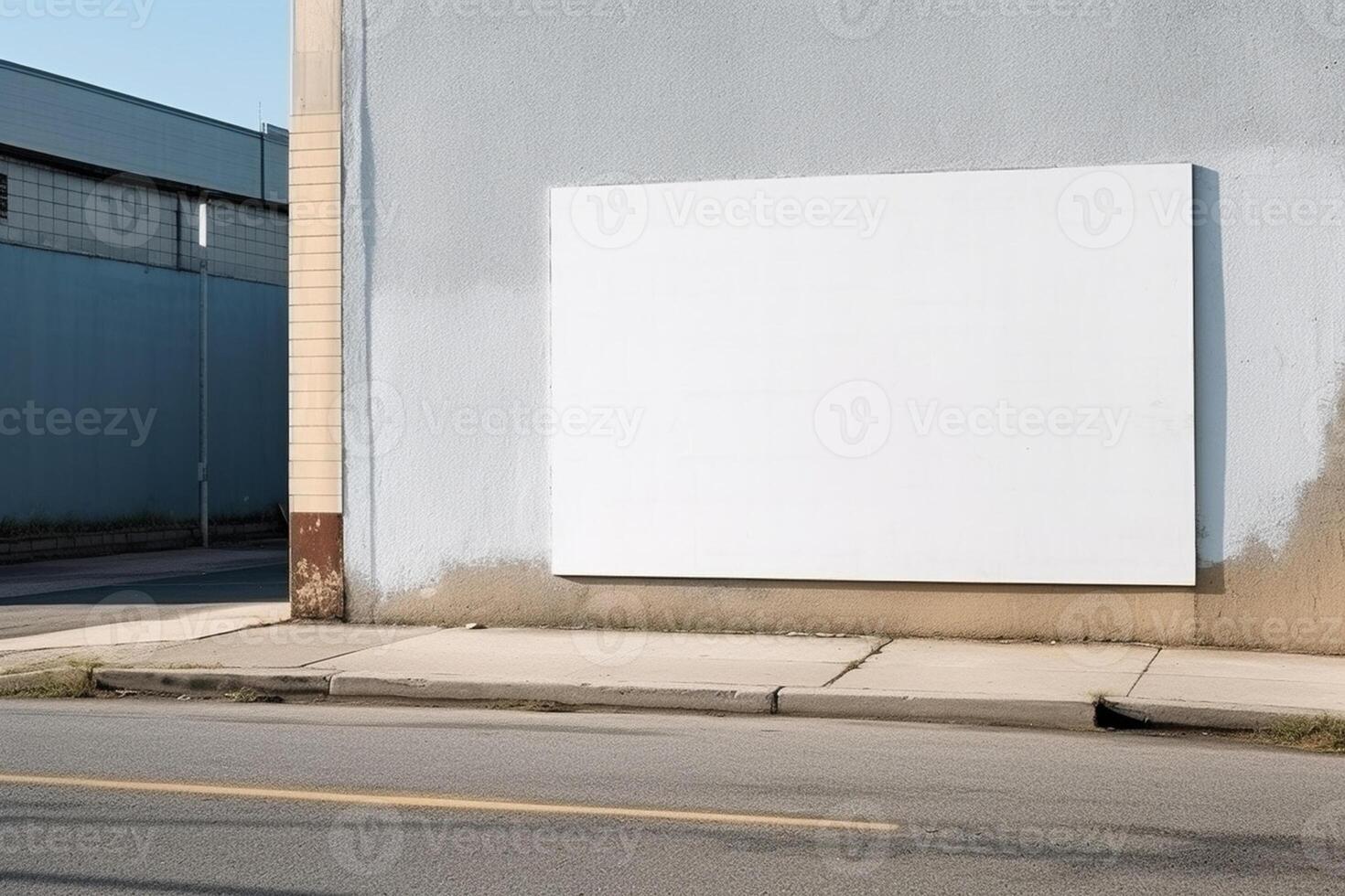 A blank white billboard mockup on a sidewalk in a city photo