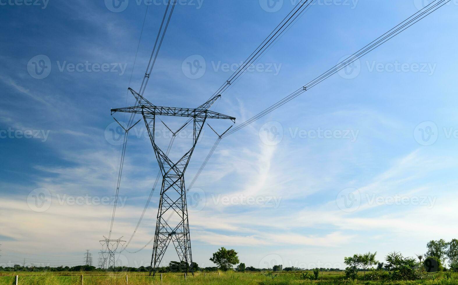 high voltage pole with blue sky photo