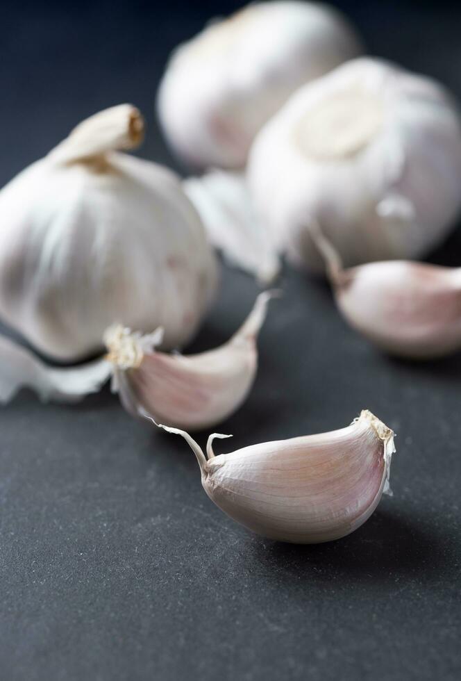 white garlic on black background, for cook thai food photo