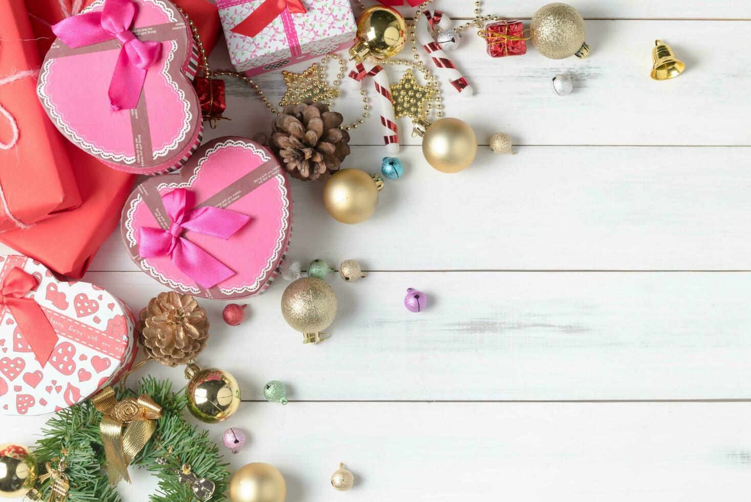 Gift box with colorful small bell and Christmas ball photo