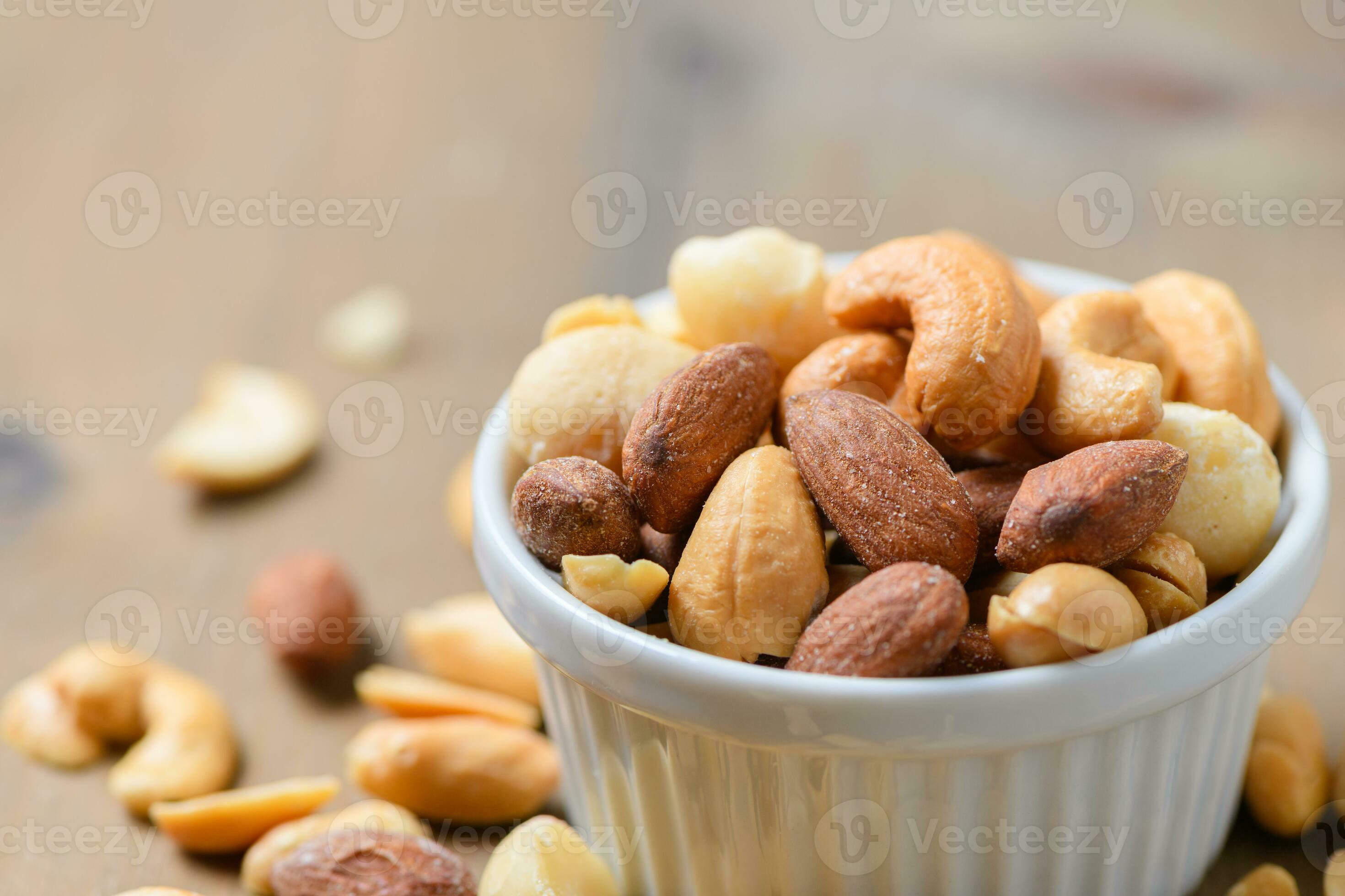 Closed up of salted cocktail nuts in cup 23311294 Stock Photo at Vecteezy